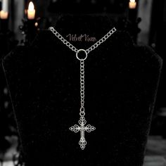 Forgive me father 🖤 This rosary inspired necklace features a curb style chain and a silver toned gothic style cross pendant with rhinestones.  Choose desired length when ordering. You can control whether you want to to fit tight or hang loose. Please take the time to measure your neck to ensure your satisfaction. Regardless of size chosen, there will be extra clasp rings attached to add a little more adjustable length.  Silver toned metals (silver plated chain) Lobster clasp closure  Handmade w Gothic Metal Cross Necklace, Gothic Metal Cross Necklaces, Gothic Jewelry With Cross Pendant And Adjustable Chain, Gothic Jewelry With Adjustable Chain And Cross Pendant, Silver Cross Jewelry For Halloween, Silver Cross Pendant Jewelry For Halloween, Halloween Silver Jewelry With Cross Pendant, Gothic Cross Chain Jewelry, Silver Ankh Gothic Necklace