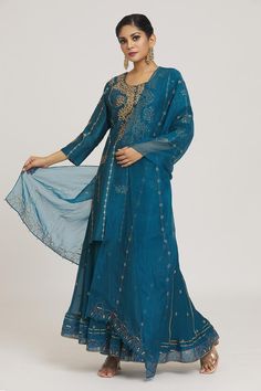 Cobalt blue kurta with bead and gota embroidered dot motifs. Comes with embroidered sharara and dupatta.
Components: 3
Pattern: Embroidered
Type Of Work: Zardozi, Bead, Gota
Neckline: Round
Sleeve Type: Three quarter
Fabric: Pure Silk Chanderi, Organza, Chiffon
Color: Blue
Other Details: 
Straight silhouette
Tassel detail
Occasion: Sangeet,Wedding - Aza Fashions Embroidered Sharara, Kurta Sharara Set, Kurta Sharara, Blue Kurta, Sharara Set, Dots Pattern, Set For Women, Aza Fashion, Pure Silk