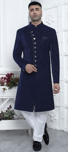 Blue color Sherwani in Velvet fabric with Embroidered, Sequence, Thread work Blue Kurta With Intricate Embroidery For Reception, Blue Embroidered Sherwani For Reception, Formal Blue Sherwani With Dabka Work, Traditional Blue Sherwani With Chikankari Embroidery, Blue Sherwani With Resham Embroidery, Blue Sherwani With Chikankari Embroidery, Blue Fitted Sherwani With Resham Embroidery, Royal Blue Sherwani For Eid, Royal Blue Fitted Kurta