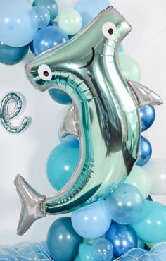 the balloon is shaped like a dolphin