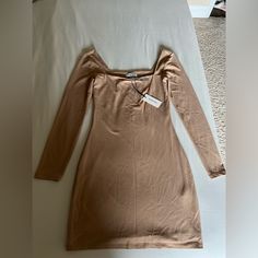 Aritzia Contour Squareneck Longsleeve Mini Dress. Longsleeve Squareneck Dress With Bra Strap Keeper. Camel Color. Attempted To Wear Once But Too Short For Me At 6’2”. 94% Nylon 6% Elastane. Bodycon Long Sleeve Dress For Brunch, Long Sleeve Bodycon Dress For Brunch, Beige Long Sleeve Stretch Mini Dress, Beige Long Sleeve Mini Dress For Date Night, Long Sleeve Bodycon Dress For Brunch In Fall, Fitted Beige Long Sleeve Dress, Spring Long Sleeve Bodycon Dress For Brunch, Casual Off-shoulder Bodycon Dress For Brunch, Longsleeve Mini Dress