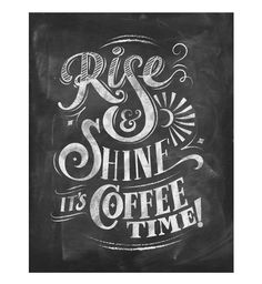 a chalkboard sign that says rise and shine it's coffee time