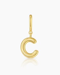 Description Personalize your favorite chain necklace with this playful helium alphabet charm. Wear your initials or a loved one's - you can make a set here. Product Details Total drop 11/16" Letter measures 5/16" by 3/8" Hinge closure measures 3/16" by 5/16" Available in 18k gold plated brass Avoid contact with anything containing derivatives of alcohol Gold Classic Initial Necklace With Charms, Personalized Gold Charms For Everyday, Personalized Yellow Gold Charms For Everyday, Gold Monogram Charms For Gifts, Personalized Yellow Gold-plated Charms, Personalized Yellow Gold Plated Charms, Everyday Gold Charms, Tarnish Resistant, Everyday Yellow Gold Pendant Charms, Everyday Tarnish-resistant Gold Charms