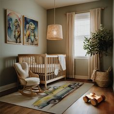 a baby's room with a crib, rocking chair and potted plant