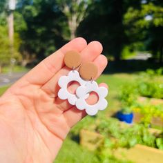 April showers really do bring May flowers. These adorable lightweight flowers are perfect for your summer or spring outfit. These earrings are bright and beautiful.  All earring backs are hypoallergenic stainless steel studs that are nickel free. They're superglued and then covered with resin for extra strength.  All earrings are handmade in small batches. Slight differences and imperfections are to be expected, where they're all handmade art.  So actual item you receive could or will differ sli White Round Flower Earrings, Pierced, White Round Flower Earrings Pierced, White Round Flower Earrings, White Round Pierced Flower Earrings, White Flower Charm Earrings For Everyday, White Dangle Earrings With Flower Charm, White Flower-shaped Pierced Earrings, White Flower Charm Earrings, White Hypoallergenic Round Flower Earrings