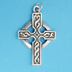 DESCRIPTION This is a gorgeous sterling silver detailed Celtic cross pendant. With its flowing lines and shiny circle, it makes a bold statement. The back of the cross has carving on it as well. Truly a magnificent piece. Original design by Pat Frey 1 11/16 inch length Type: Three Dimensional Item Number: 0965 Symbolic Sterling Silver Cross Pendant, Symbolic Sterling Silver Cross Pendant Jewelry, Sterling Silver Cross Pendant Symbolic Jewelry, Sterling Silver Engraved Cross Pendant, Engraved Sterling Silver Cross Pendant, Protection Symbols, Gold Cross Pendant, Celtic Cross, Silver Prices