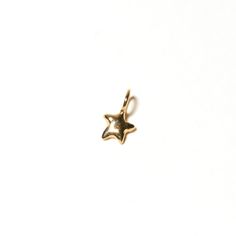 Mini puffy star charm in 14K gold. Select below for the charm only or to add a 16” 14K gold cable chain. Recycled 14K Gold. Made in small batches in New York City. "you are my sun, my moon, and all my stars." - e.e. cummings E E Cummings, Accessory Inspo, Mini Charm, Jewelry Lookbook, Gold Piece, Jewelry Outfit, Dress Jewelry, Jewelry Inspo, Star Charms