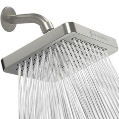 a shower head with the water flowing from it