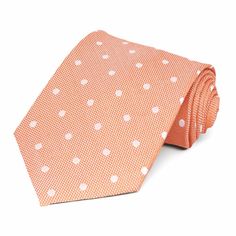 Spoil yourself with our line of Regent Morris Neckwear®. This fun bright tangerine dotted tie is made from a heavyweight blend of silk and viscose. Versatile for business or formal attire. Cut in a traditional 3.5-inch width. Product Features • Regent Morris Neckwear® • Traditional 3.5" width, at the widest point • 57" length, tip to tip • Matching keeper loop • Made from 50% Silk, 50% Viscose • Imported Summer Office Attire, Men's Ties, Orange Dots, Polka Dot Tie, Navy Blue Suit, Designer Ties, Orange Tie, Brown Suits, Navy Suit