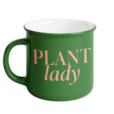 a green coffee mug with the words plant lady printed on it