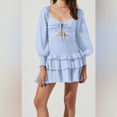 This Stunning Marietta Dress Features A Sweetheart Neckline That Leads To A Cinched Bust And Cutout Accents. Smocked Waist And Tiered Ruffle Mini Skirt. Smocked Back. Long Puff Sleeves With Smocked Cuffs. Fully Lined. New With Tag Material: 100% Polyester Colors In Pictures Look Slightly Different Due To The Lighting Elegant Blue Mini Dress With Smocked Bodice, Light Blue Long Sleeve Ruched Dress, Flirty Blue Dress With Smocked Bodice, Light Blue Long Sleeve Ruched Mini Dress, Light Blue Smocked Bodice Mini Dress, Blue Mini Dress With Smocked Bodice, Blue Mini Dress With Smocked Back For Daywear, Blue V-neck Mini Dress With Smocked Bodice, Chic Blue Mini Dress With Smocked Bodice