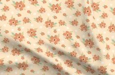 an orange and white floral print fabric