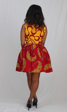 "Gorgeous and show-stopping is our Red African Ankara flirty mini skirt! Fully lined with red tulle and red satin - stylish and special occasion worthy. We especially love this skirt with black stilettos. A high quality skirt should be a staple in your closet! 💃🏽 Red African Party Skirt, Ankara Party Skirts, Dashiki Skirts. Pair this skirt with some matching crop tops options here! https://www.etsy.com/listing/820010543/african-print-crop-top-ankara-party-tops https://www.etsy.com/listing/6092 Red A-line Party Skirt, Red Pleated Knee-length Mini Skirt, Red Pleated Skirt Dress For Party, Red Party Dress With Pleated Skirt, Red Knee-length Skirt For Party, Red Knee-length Party Skirt, Red Knee-length Lined Mini Skirt, Red Knee-length Mini Skirt For Summer, Red Fitted Dresses With Lined Skirt