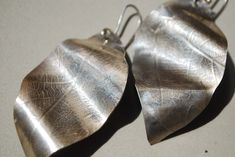 Unique silver leaf earrings are oversized statement earrings for woman, Nature inspired imprint leaf texture earrings. Unusual earrings are artsy jewelry gift for girlfriend or yourself). Handmade silversmith Sterling silver Mother of pearl Cornelian More earrings see here https://www.etsy.com/shop/FaunaSilverGems?ref=seller-platform-mcnav&section_id=39244059 Elegant Handmade Metallic Jewelry, Handmade Sterling Silver Nature-inspired Earrings, Handmade Metal Leaf-shaped Earrings, Handmade Leaf-shaped Metal Earrings, Silver Leaf-shaped Handmade Earrings, Silver Leaf-shaped Metal Earrings, Leaf Earrings Silver, Silver Leaf-shaped Brass Earrings, Bohemian Nickel-free Leaf-shaped Earrings