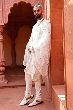 Ivory kurta with embroidered floral jaal patterns. Comes with churidar and embroidered dupatta. - Aza Fashions White Unstitched Suit With Pallu And Straight Kurta, White Unstitched Suit With Pallu In Straight Kurta Shape, White Unstitched Suit With Pallu For Transitional Season, White Unstitched Wedding Suit With Gota Work, White Unstitched Straight Kurta Suit With Pallu, White Churidar With Cutdana For Ceremonial Occasions, Ceremonial White Churidar With Cutdana Details, Ceremonial White Churidar With Cutdana, White Unstitched Suit For Traditional Ceremonies