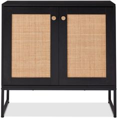 a black cabinet with two doors and wicker panels on the front, against a white background