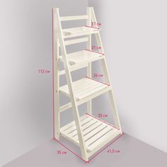 a white wooden shelf with measurements for the top and bottom shelves on each side,