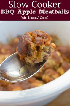 a close up of a spoon in a bowl of food with the words slow cooker bbq apple meatballs