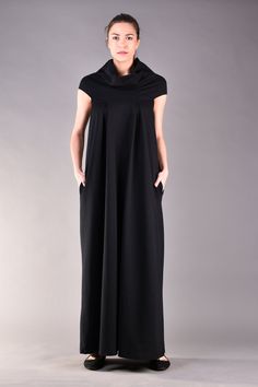 "Black Long Dress, Loose Dress, Black Maxi Dress. Stunning extravagant sleeveless dress in black. The model features a cowl neckline and a loose fit cut which is the favourite choice for plus size women because this design is very comfortable and hides any flaws. The black party dress is suitable for different occasions matched with heels or flats and some interesting accessories. ^ Sizes: The item can be made in sizes from XXS to 7XL. Please, use the size chart below or if you are not sure abou Chic Black Sleeveless Evening Dress, Black Sleeveless Stretch Maxi Dress, Black Sleeveless Formal Dress, Black Stretch Sleeveless Evening Dress, Black Stretch Sleeveless Dress For Evening, Elegant Black Sleeveless Long Dress, Elegant Black Long Sleeveless Dress, Chic Black Sleeveless Long Dress, Chic Black Long Sleeveless Dress