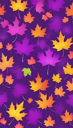 many different colored leaves on a purple background