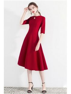 Red Fit And Flare Midi Dress For Evening, Elegant Red Fit And Flare Midi Dress, Red Dresses Modest, Elegant Red Fit And Flare Dress, Red A-line Midi Dress For Banquet, Red A-line Midi Dress For Party, Red Dress With Red Bow For Evening, Elegant Fitted Dresses With Red Bow, Red A-line Christmas Dress