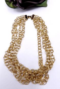 "Vintage gold tone 4 strand necklace, In good vintage condition, It's from 16\" long to 19\" long 8 mm wide. Weighs 3.5 Oz. Thanks." Gold Double Strand Layered Necklace With Chunky Chain, Elegant Gold Layered Necklace With Chunky Chain, Gold Chain Multi-strand Layered Necklace, Gold-tone Multi-strand Necklaces For Formal Occasions, Gold-tone Multi-strand Necklace For Formal Occasions, Multi-strand Gold Chain Necklace, Gold Multi-strand Chain Necklace, Formal Multi-strand Metal Necklaces, Formal Multi-strand Metal Necklace