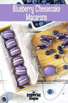 blueberry cheesecake macarons in a box on a wooden table with the title overlay