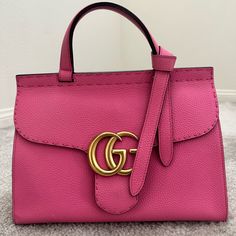 Beautiful Pink Bag, Authentic Gucci Marmont Two Way With Complete With Dust Bag. With Slight Signs Of Wear As Shown In The Picture. There’s A Small Lipstick Stain Not Almost Not Visible As Shown In The Picture. No Odor. Bag Lock Is Working. Designer Gucci Bags With Cc Turnlock Closure, Designer Shoulder Bag With Cc Turnlock Closure, Designer Bags With Turn-lock Closure, Pink Shoulder Bag With Cc Turnlock Closure, Gucci Pink Top Handle Shoulder Bag, Pink Gucci Shoulder Bag For Travel, Gucci Pink Shoulder Bag With Detachable Handle, Luxury Pink Gucci Bag, Elegant Pink Gucci Shoulder Bag