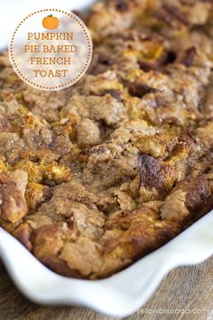 pumpkin pie baked french toast in a casserole dish on a wooden table with text overlay