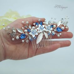 This is a gorgeous ''Julie'' blue hair comb from our wedding accessories collection. The bridal hair piece is embellished with sapphire blue sparkling crystals and glass pearls. Each branch is flexible and can be moved to your liking. This hair jewelry would be perfect as a back or side hair accessory. This pearl crystal hair comb is the perfect accessory for brides, bridesmaids, Proms, homecomings, and any special occasions. An elegant sapphire hair comb gracefully complement Your hairstyle. ☀ Available in silver and gold, measures approximately 6,69" wide by 2,1" tall (17x5,5 cm). ❤ All my wedding hair accessories are made using the highest quality materials with the utmost care and attention to detail. I'm sure you will get a lot of compliments by wearing this beautiful floral hair comb Elegant Blue Headpiece For Events, Blue Wedding Hair Pieces, Navy Blue Hair Piece For Wedding, Sapphire Hair Piece, Sapphire Hair, Diamond Headpiece, Silver Wedding Hair, Sapphire Hair Comb, Blue Headpiece