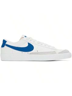 Nike 
White Blazer Low '77 Vintage Sneakers 
Low-top buffed leather sneakers in white. 
. Suede trim at toe and outer side 
. Lace-up closure 
. Logo patch at padded tongue 
. Padded collar 
. Swoosh appliqué and perforated detailing at sides 
. Logo printed at heel counter 
. Mesh lining 
. Treaded vulcanized rubber sole 
Please note that this item may be shipped only within North America. 
Supplier color: Summit white/Platinum tint/White/Photo blue 
Upper: leather. Sole: rubber. 
Made in India White High-top Skate Shoes With Logo Patch, White Skate Shoes With Logo Patch For Skateboarding, Casual Athletic Shoes, Blazer Low, Vintage Sneakers, Nike White, White Blazer, White Photo, Outdoor Shoes