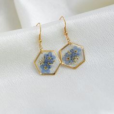 Forget Me Not Earrings, Resin Real Pressed Flower Jewerly, Forget-Me-Not,  Hexagon Jewelry, Earrings for Women, Gift for Women, Gift for Her ✧Material: Stainless Steels 💙Forget Me Not: * Eternal love: Forget-me-not flowers symbolize eternal love and loyalty, conveying undying emotions for lovers or spouses. * Deep longing: Forget-me-not flowers express deep longing for loved ones, friends, or romantic partners, signifying that even separated by distance, hearts remain closely connected. * Loyal Nickel-free Hexagon Earrings As A Gift, Nickel-free Hexagon Earrings For Gift, Blue Hexagon Jewelry For Gifts, Handmade Hexagon Jewelry, Hexagon Blue Jewelry Gift, Hexagon Jewelry, Casual Earrings, Earrings Resin, Pink Peony