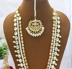 Kundan Bridal Choker Necklace Earrings Tikka Set, Long Necklace Rani Haar Pearls Bollywood Jewellery Set, Party Wear Necklace, Statement Set ITEM DESCRIPTION Metal = Gold Plated Occasion = Wedding, Party Wear, Bridal Color = White and Yellow Long Necklace = 13 Inches Long ( Adjustable String/Dori), Earring Size = 3.5 Inches Long, tikka - 6 Inches Long Free Shipping White Necklace With Latkans For Party, White Necklaces With Latkans For Parties, Party White Necklace With Latkans, Party White Tassel Necklaces, Rani Har, Purple Choker, Kundan Jewellery Bridal, Rani Haar, Vintage Wedding Jewelry