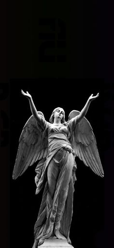 an angel statue is shown in black and white with the text, 13 + photoshopped