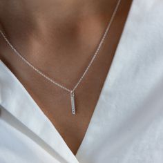 A petite version of our best selling Mini Bar Necklace. Add a little sparkle with our diamond dusted option or up the ante with a diamond set in the pendant. We love adding a mini bar and petite bar pendants to one chain for an extra personal touch. details+ petite bar pendant measures 5/8" long+ add a brilliant 1.5mm diamond option+ on model : 16 & 18" adjustable necklace+ s hook closure+ handmade with love in our Georgia studio availability handmade to order. ships in 5 - 14 days.current produ Everyday Minimalist Sterling Silver Birthstone Necklace, Minimalist Silver Bar Necklace For Anniversary, Minimalist Silver Birthstone Necklace For Everyday, Everyday Minimalist Silver Birthstone Necklace, Dainty Sterling Silver Bar Necklace For Everyday, Minimalist Sterling Silver Bar Necklace For Anniversary, Silver Dainty Bar Necklace For Everyday, Bar Pendants, Promise Necklace