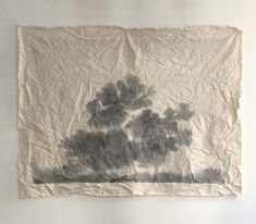 a piece of paper that has been drawn on to the wall with trees in it