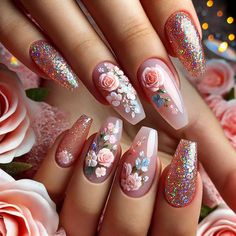 the manies are decorated with flowers and glitters on their fingers, while the nails are