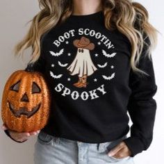 This shirt is the perfect Halloween outfit or perfect to wear to all of your fall festivities like, pumpkin picking, sipping on a pumpkin spice latté, or roasting marshmallows at a pumpkin carving party! Boot Scootin Spooky Cute Halloween Ghost Sweatshirt Boot Scootin Spooky, Fall Festival Outfit, Pumpkin Carving Party, Cute Halloween Ghost, 1st Birthday Cake Smash, Halloween Party Outfits, Ghost Sweatshirt, Fall Festivities, Spooky Cute