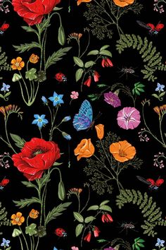 a black background with colorful flowers and butterflies