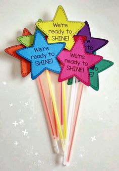 four star shaped straws with writing on them that say we're ready to shine