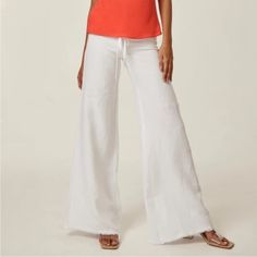 Wide Leg Linen Pocket Pant A Classic Wide-Leg Silhouette With A Drawstring Waist, These Linen Pants Make For The Perfect Easy Yet Sophisticated Look. 100% Linen Wide Leg Drawstrings Raw Edge Hem Machine Wash Cold Made In Usa Of Imported Fabric Questions? Leave A Comment Below! White Full Length Wide Leg Pants For Beach, White Relaxed Fit Pants For Beach Season, White Cotton Pants For Beach Season, Casual Wide Leg Pants For Beach Season, Versatile Fitted Bottoms For Vacation, Casual White Wide Leg Pants For Vacation, Mid-rise Pants For Beach In Summer, Mid-rise Summer Beach Pants, Beach Stretch Pants