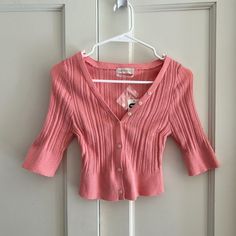 Nwt Uo Pink Cropped Cardigan Size Large Brand: Urban Outfitters Size: Large Color: Pink ~ Cropped Button Up Cardigan ~ Cropped Above The Waist In A Shrunken + Body-Hugging Silhouette With A Button Placket At The Front. ~ Ribbed, V-Neck, Button Closure, ~ New With Tags, Has Never Been Worn, And Is In Perfect Condition. #Urbanoutfitters #Cardigan #Croppedcardigan #Corporatebaddie #Balletcore Spring Barbiecore Spring V-neck Sweater With Button Closure, Spring Sweater With Buttons For Day Out, Casual Spring Sweater With Snap Buttons, Buttoned Sweater For Spring Day Out, Summer Button-up Sweater With Buttons, V-neck Sweater With Buttons For Spring, V-neck Button Sweater For Spring, Spring Snap Button Button-up Cardigan, Spring Button-up Cardigan With Snap Buttons