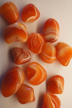 This listing is for one of small carnelian tumbles. The average 8 grams in weight. Carnelian is red agate. These carnelian are a rich warm orange, with banding. They are tumbled and polished nicely. One with banding will be hand selected for you. Most of these look like plain carnelian on one side, and banded on the other. Origin: Brazil Mohs Hardness Scale: 7 Some of us are just beginning our relationship with rocks and crystals. Choosing a rock or crystal is Intuitive... be Intuitive...and hav Carnelian Stone Aesthetic, Orange Crystal Aesthetic, Orange Stones Crystals, Carnelian Wallpaper, Red Crystal Aesthetic, Carnillean Crystal, Carnelian Nails, Warm Orange Aesthetic, Carnelian Aesthetic