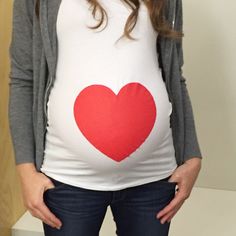 LOVE this shirt for pregnancy announcement pictures!  . . . . . . . . . . #Pregnancyannouncement  #pregnant #momtobe #expecting #momlife #babyonboard #bunintheoven #maternitystyle #maternityboutique #momstheword Maternity Cotton T-shirt Bump Friendly, Casual Fitted Maternity T-shirt, Fitted Bump Friendly Maternity Tops, Fitted Maternity Tops Bump Friendly, Maternity Cotton White Tops, Fitted Nursing Friendly Cotton Top, Fitted Cotton Nursing-friendly Tops, Maternity Cotton Tops In White, Bump Friendly Cotton Tops For Gender Reveal