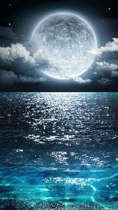 an image of the moon over water with clouds and stars in the sky above it