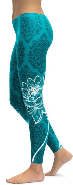 We decided that we need another gorgeous design for our Zen / Yoga collection. Our designer did an amazing job on creating the Gearbunch Cyan Blue Lotus Leggings, the background is cyan blue with a subtle black mandala pattern and the real eye catcher is the bright white lotus flower, which is wrapped perfectly around your legs. Be Happy, Be Bright, Be You with Gearbunch Turquoise Stretch Yoga Bottoms, Stretch Turquoise Yoga Bottoms, White Yoga Pants, Black Mandala, White Lotus Flower, Blue Jellyfish, Zen Yoga, Blue Lotus, Cyan Blue