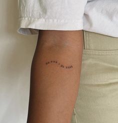 a woman's arm with writing on it