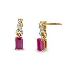 Elevate your look with these elegant gemstone drop earrings. Created in 14K gold, each drop features a 5.0 x 3.0mm emerald-cut bright red ruby. The split linear post glistens with a twist of diamond-accented and polished ribbons. Buffed to a brilliant luster, these earrings secure comfortably with friction backs. Gemstone Drop Earrings, Peoples Jewellers, July Birthstone, Ruby Diamond, Red Ruby, Emerald Cut, Bright Red, Gold Metal, Ruby