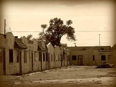 an old run down street with no cars on it