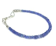 Thank you for coming in! Absolutely beautiful Stone Name:-> Natural Tanzanite, Bracelet Grade: AAA++ Quality Colour:-> Blue  Product Type:-> Faceted Beads. Bracelet Shape:-> Rondelle shape. Size(Dimension-> 4-5 MM Approx. oººooººooººooººooººooººo Loved the collection !! Here is the link to some similar products we have ;) https://rubygemnjewels.etsy.com Shipping Policy FREE STANDARD SHIPPING on all orders above $ 35 and FREE EXPRESS SHIPPING on orders above $ 250. If you want Express Shipping for orders below $ 250. **Estimated Delivery Time** Standard Shipping: 10-15 Days Express Shipping: 3-9 Days <> Returns & exchanges We gladly accept returns and exchanges Contact us within: 14 days after delivery Send back the items within: 30 days of delivery We don't accept cancellations But please Tanzanite Beads, Tanzanite Bracelet, Blue Tanzanite, Bracelet Blue, Bracelet Gemstone, Natural Tanzanite, Beads Bracelet, Stone Names, Faceted Bead